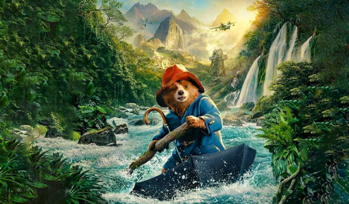 Paddington åker på ett paraply på en flod.