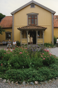 Mangårdsbyggnaden på Husby gård hyser ett gårdsmuseum. Patron Gustafsons hem och samlingar utgör stommen i museet. 
Gården har anor sedan långt tillbaka i tiden och nämns i skrift första gången år 1298. Gården har under historien tjänat som kungsgård och försett kronan med förnödenheter så långt tillbaka som medeltid, och kanske även vikingatid.
1858 föds Teodor Gustafson i Markim. Husby Gård har vid denna tid gått i arv i Teodors familj sedan början av 1700-talet och, trots att han är näst yngst i syskonskaran, kommer just Teodor att så småningom ta över Husby. Han får tidigt delta i sysslorna på gården som på den tiden sköttes med djur och folk, då det inte fanns maskiner i lantbruket. Här inleds Teodor Gustafsons intresse för allt som är gammalt och fornt och drygt 30 år efter hans död blir hans familjehem museum, tack vare arvtagerskan fröken Sigrid Åkerberg.